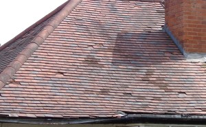Clay roof needing tiles replacing and new guttering