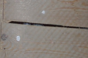 Damaged tongue and groove floorboard previously removed to access sub-floor